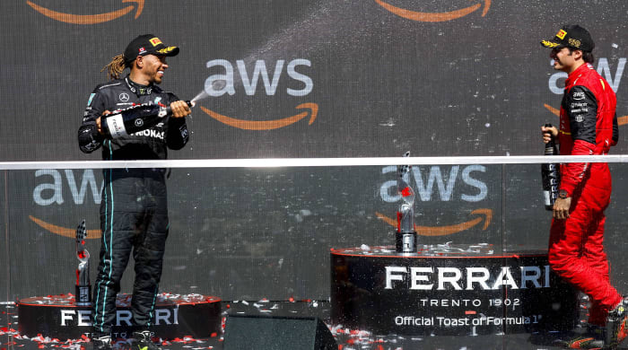 Lewis Hamilton and Carlos Sainz on the podium.